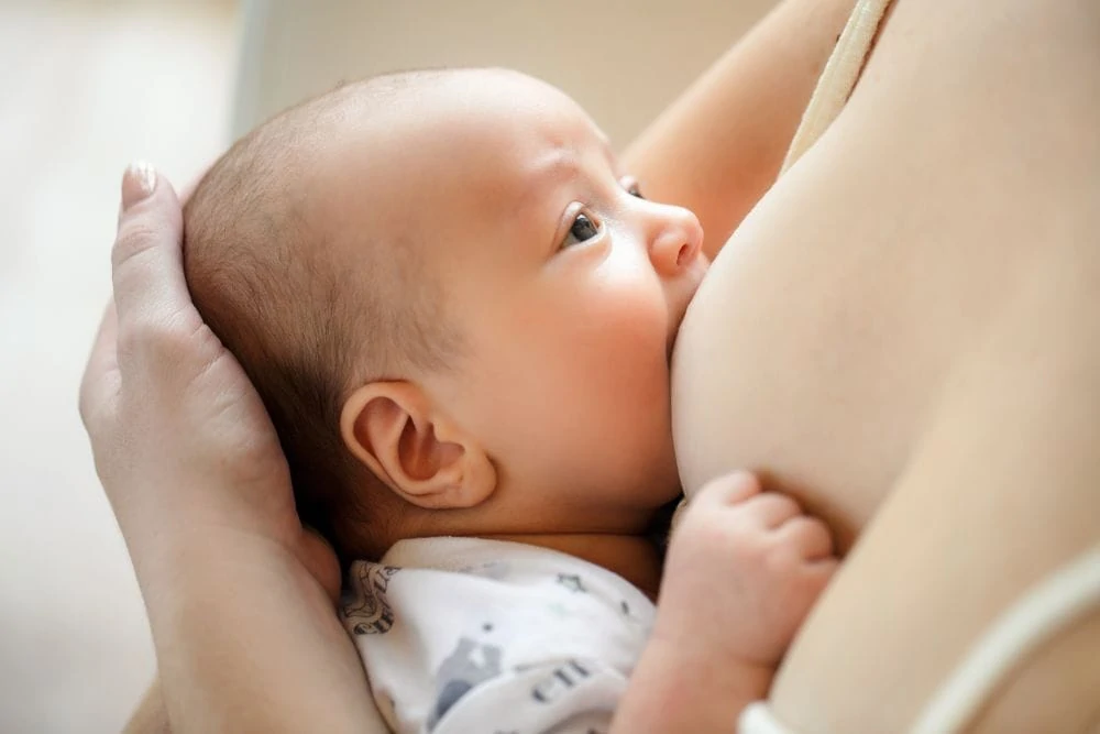 Close up of breastfeeding baby