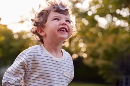 A young boy having fun in the park.