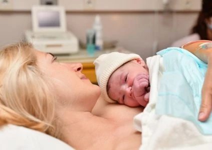 Mom holding her newborn baby